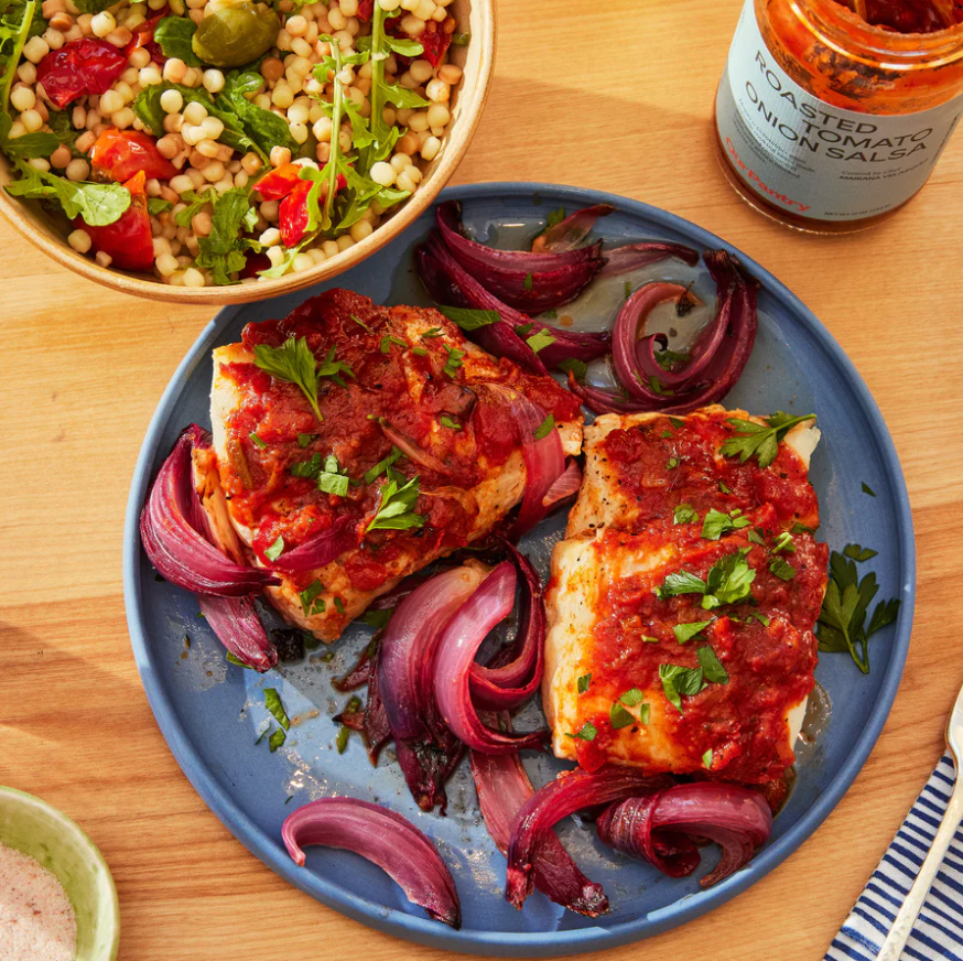 Baked fish with roasted tomato onion salsa